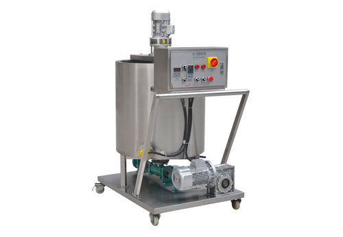 Automatic thermal-jacketed core-filling machine for extruded snack rolls and pillows.