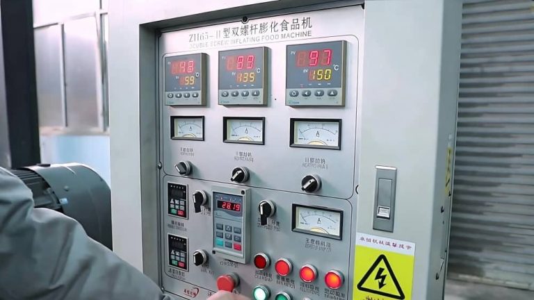 Twin Screw Extruder Manufacturer & Extrusion Solutions PLC and VFD intelligent control panel for Zhuoheng food extrusion line, designed to reduce energy consumption and motor wear.