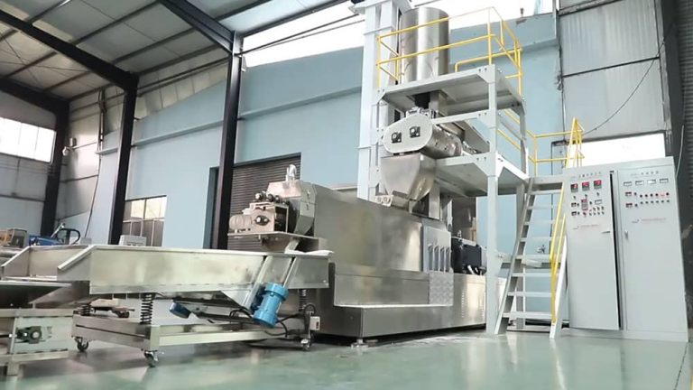 Zhuoheng biaxial differential conditioner mounted on a heavy-duty twin screw extruder for steam pre-gelatinization.